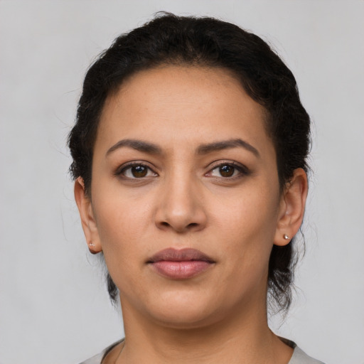 Neutral latino young-adult female with short  brown hair and brown eyes