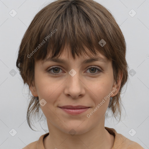 Joyful white young-adult female with medium  brown hair and grey eyes