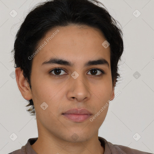 Neutral latino young-adult male with short  brown hair and brown eyes