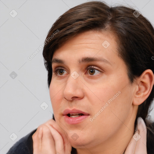 Neutral white young-adult female with short  brown hair and brown eyes