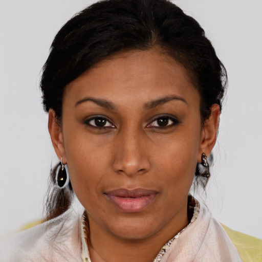 Neutral latino young-adult female with medium  brown hair and brown eyes