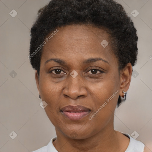 Joyful black adult female with short  brown hair and brown eyes