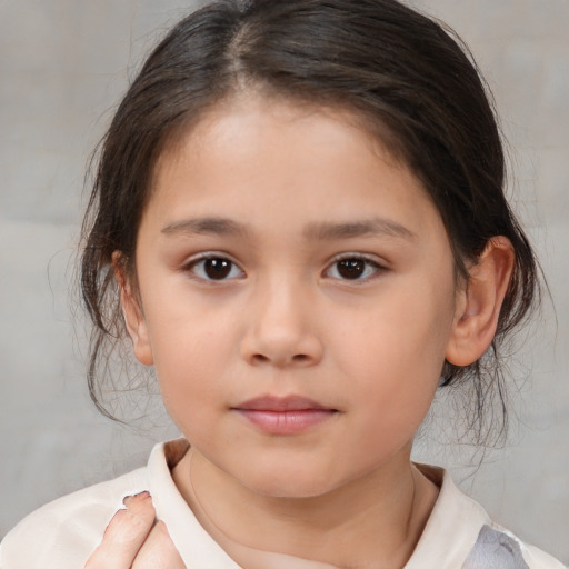 Neutral white child female with medium  brown hair and brown eyes
