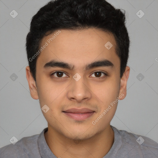 Joyful latino young-adult male with short  brown hair and brown eyes