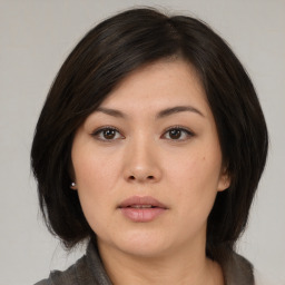 Neutral asian young-adult female with medium  black hair and brown eyes