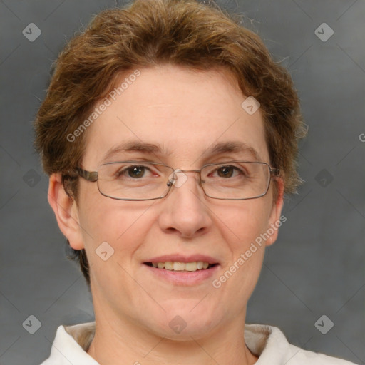 Joyful white adult female with short  brown hair and grey eyes