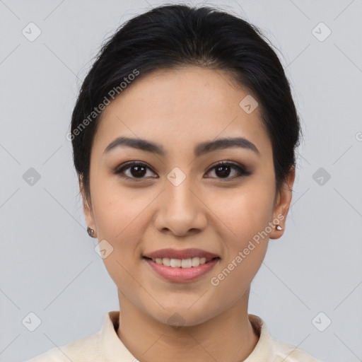 Joyful asian young-adult female with short  black hair and brown eyes