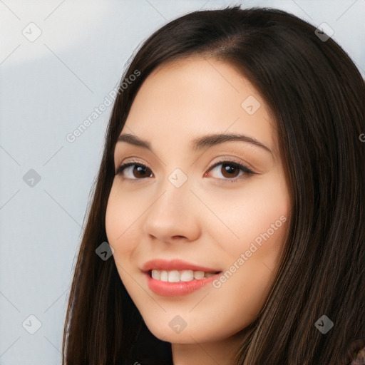 Joyful white young-adult female with long  black hair and brown eyes