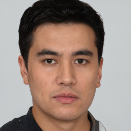 Neutral asian young-adult male with short  black hair and brown eyes