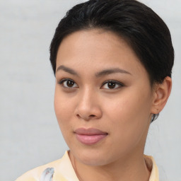 Joyful asian young-adult female with short  brown hair and brown eyes