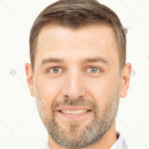 Joyful white adult male with short  brown hair and brown eyes