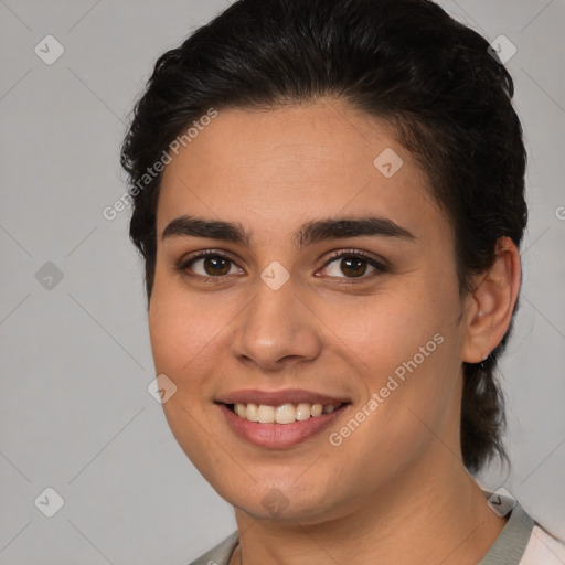 Joyful white young-adult female with medium  brown hair and brown eyes