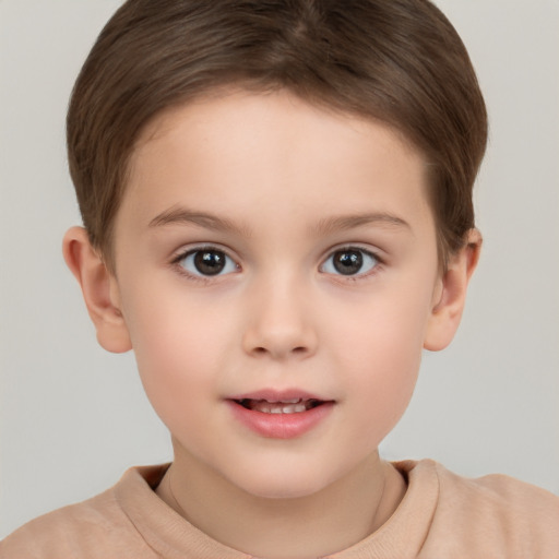 Joyful white child female with short  brown hair and brown eyes