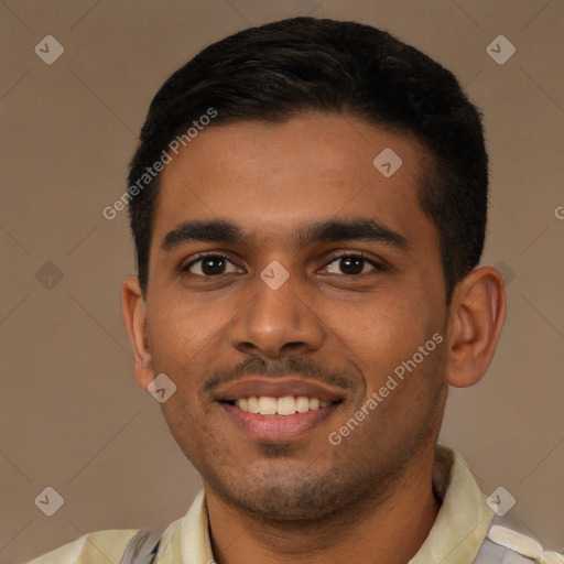 Joyful latino young-adult male with short  brown hair and brown eyes