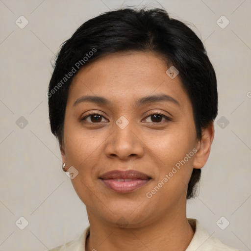 Joyful asian young-adult female with short  brown hair and brown eyes