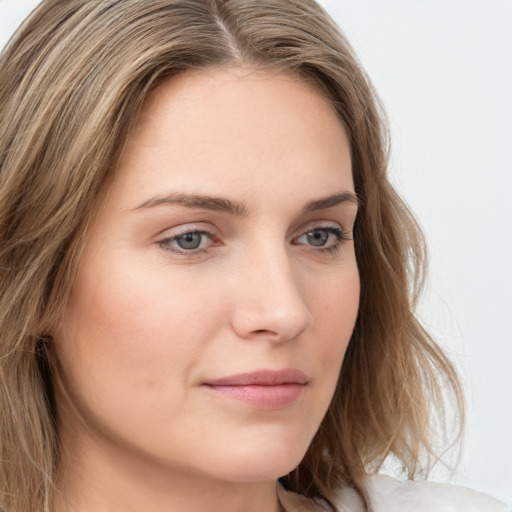 Neutral white young-adult female with long  brown hair and grey eyes