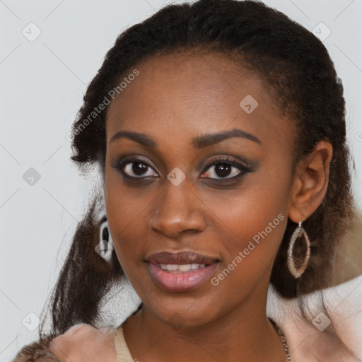 Joyful black young-adult female with medium  brown hair and brown eyes