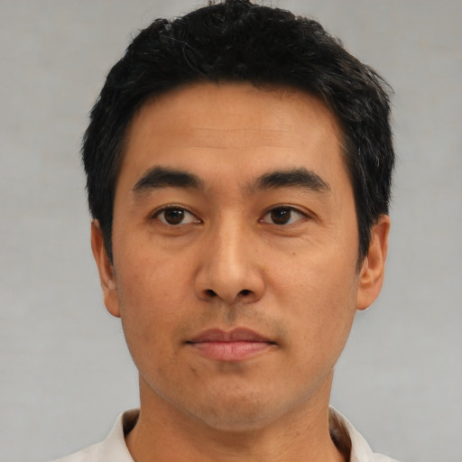 Neutral asian young-adult male with short  black hair and brown eyes