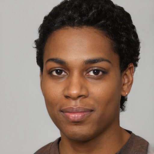 Neutral black young-adult female with short  black hair and brown eyes