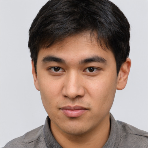 Neutral asian young-adult male with short  brown hair and brown eyes
