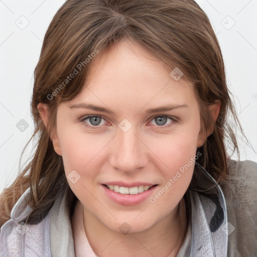 Joyful white young-adult female with medium  brown hair and blue eyes