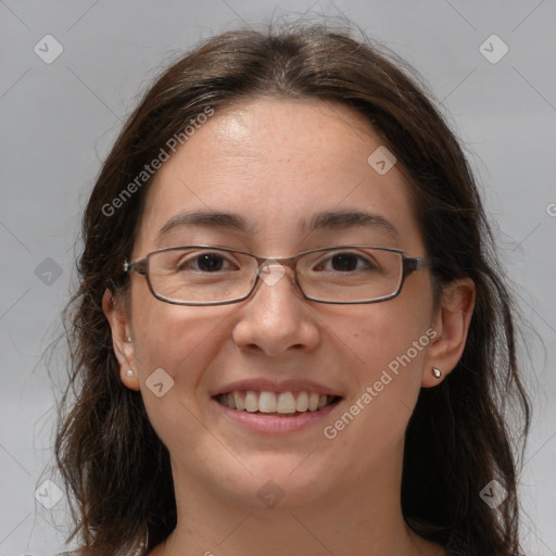 Joyful white adult female with medium  brown hair and grey eyes