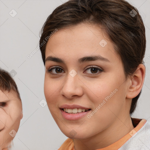 Joyful white young-adult female with medium  brown hair and brown eyes