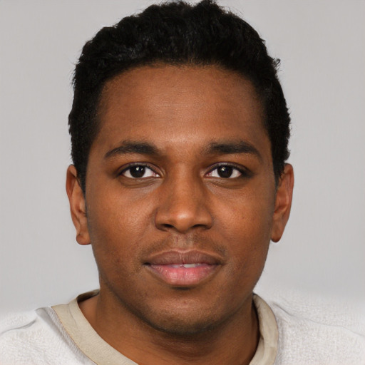 Neutral black young-adult male with short  black hair and brown eyes
