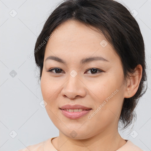 Joyful asian young-adult female with medium  brown hair and brown eyes