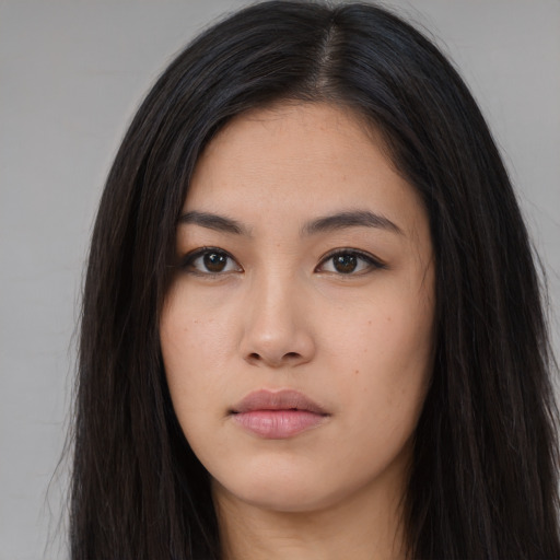 Neutral asian young-adult female with long  brown hair and brown eyes