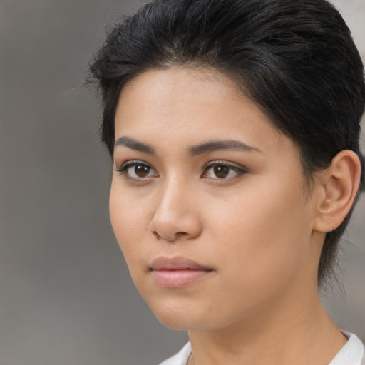 Neutral asian young-adult female with medium  brown hair and brown eyes