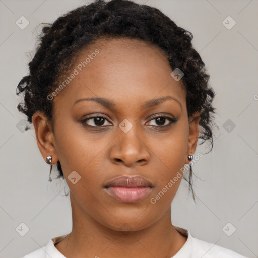 Neutral black young-adult female with medium  brown hair and brown eyes