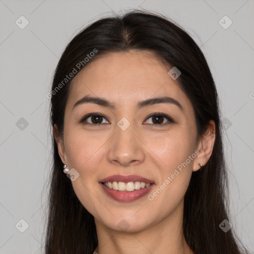 Joyful white young-adult female with long  brown hair and brown eyes