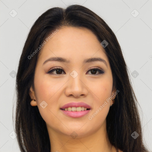 Joyful asian young-adult female with long  brown hair and brown eyes