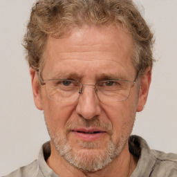 Joyful white middle-aged male with short  brown hair and brown eyes