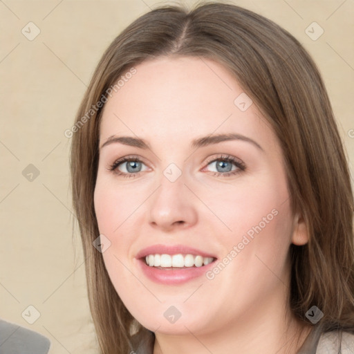 Joyful white young-adult female with medium  brown hair and green eyes