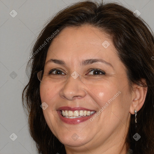 Joyful white adult female with medium  brown hair and brown eyes