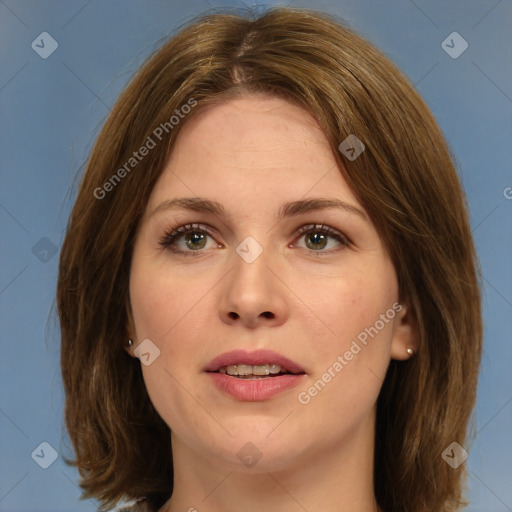 Joyful white young-adult female with medium  brown hair and green eyes