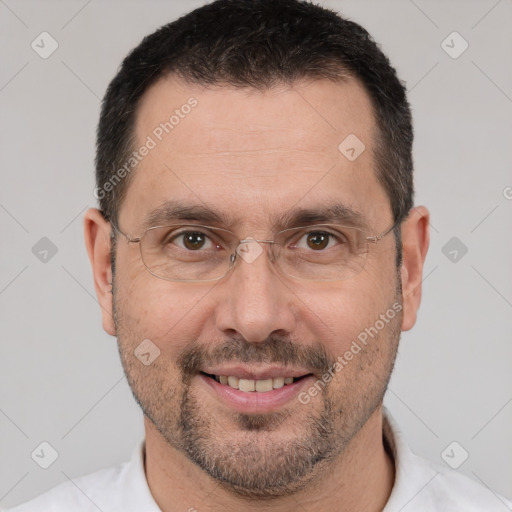 Joyful white adult male with short  brown hair and brown eyes