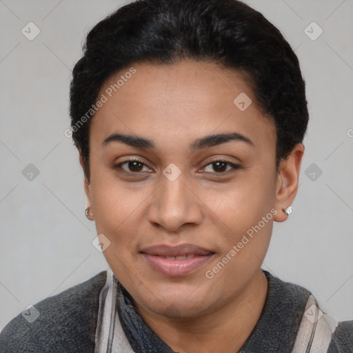 Joyful latino young-adult female with short  black hair and brown eyes