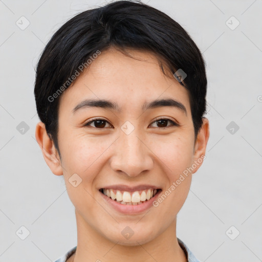 Joyful asian young-adult female with short  brown hair and brown eyes