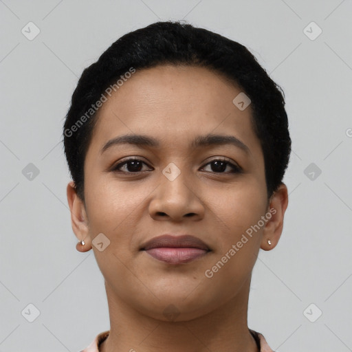 Joyful latino young-adult female with short  black hair and brown eyes