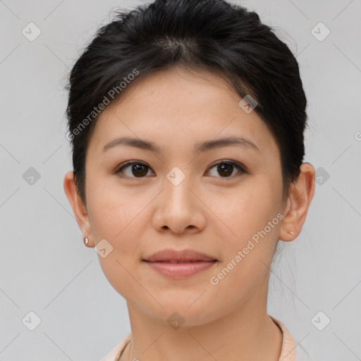 Joyful asian young-adult female with short  brown hair and brown eyes