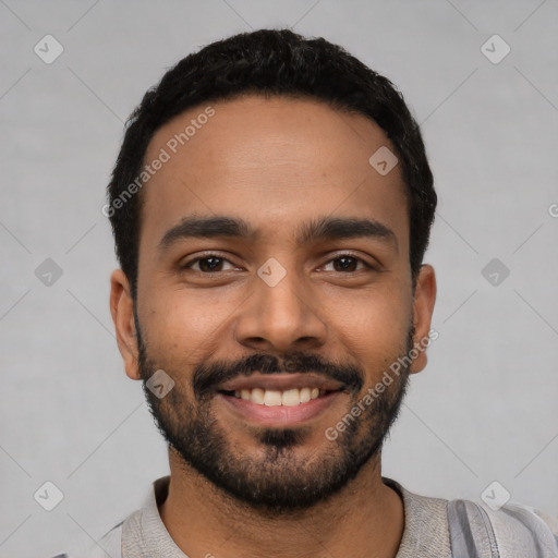 Joyful latino young-adult male with short  black hair and brown eyes