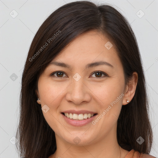 Joyful white young-adult female with long  brown hair and brown eyes