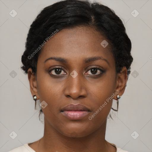 Neutral black young-adult female with short  brown hair and brown eyes