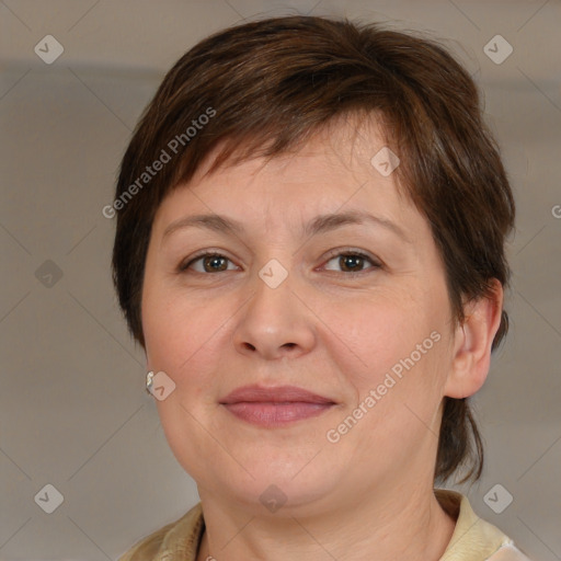 Joyful white adult female with medium  brown hair and brown eyes