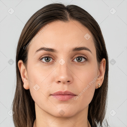 Neutral white young-adult female with medium  brown hair and grey eyes