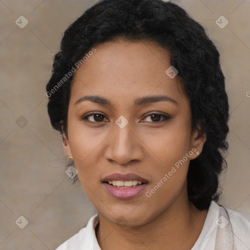 Joyful latino young-adult female with short  black hair and brown eyes