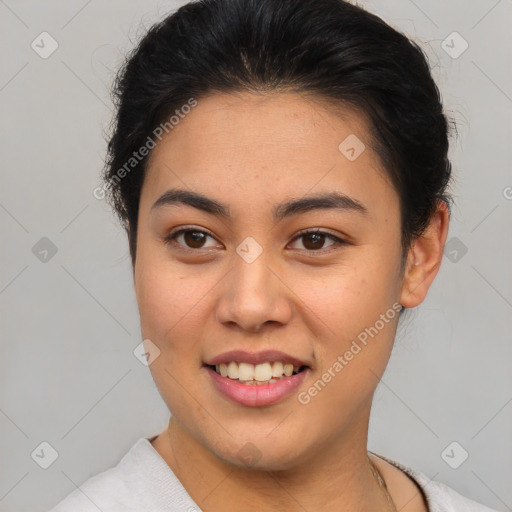 Joyful asian young-adult female with short  brown hair and brown eyes